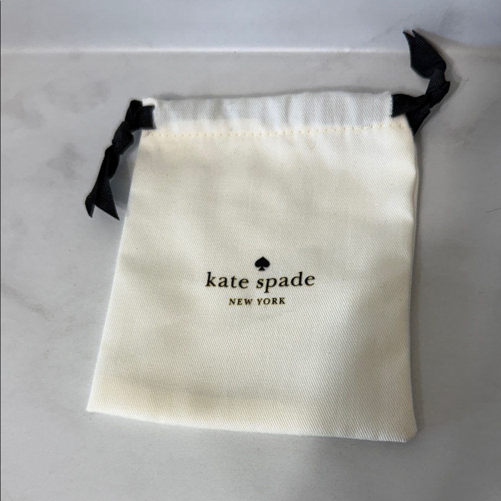 Kate Spade Ivory Pouch with Black Accents
